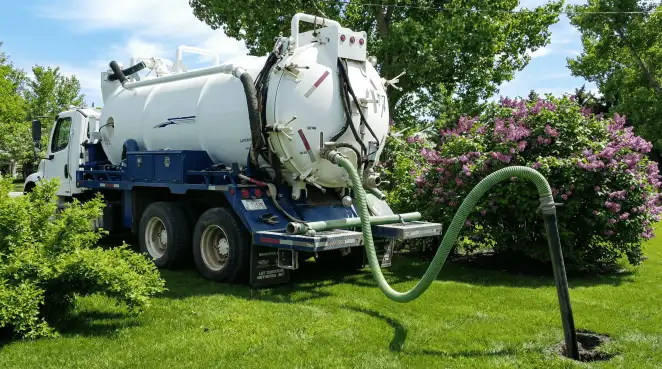 Professional vacuum truck performing residential drainage and septic maintenance in Las Vegas, NV